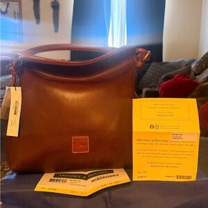 Dooney & Bourke CHESTNUT twist strap hobo. NWT